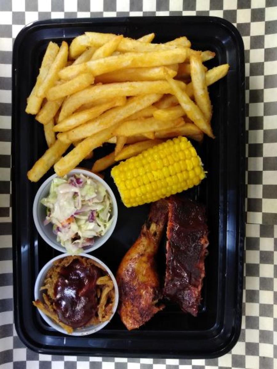 Served with 1 BBQ Rib, 1 Piece Dark Chicken, Pulled Pork - Raining BBQ & Grill restaurant in Beaverton, OR