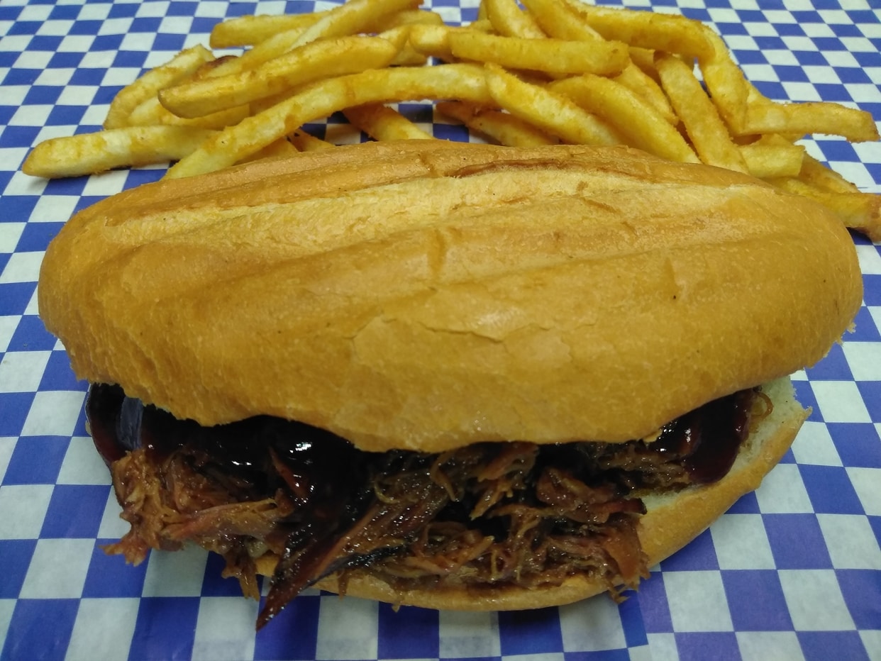 Grilled Bolillo Bun filled with our Signature Pulled Pork and served with complimentary Fries. Deluxe adds Cheese, Pickles and Chipotle-Mayo Sauce.